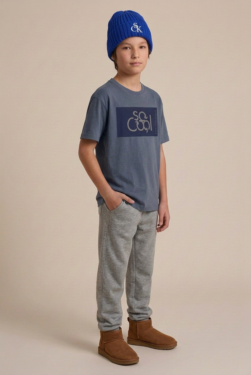 Boy in the denim-color tee and blue SCK beanie turned to the same side as the girl